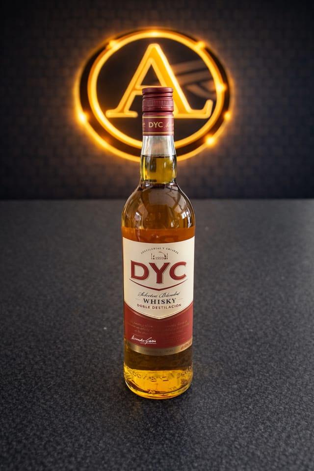 DYC Botella